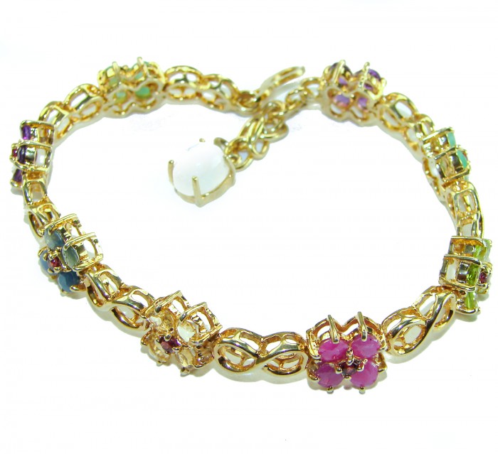 Luxurious 35.5 carat Genuine Ruby Emerald Sapphire 14 K Gold over .925 Sterling Silver Bracelet