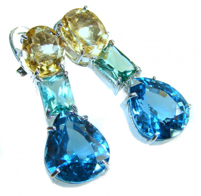 Atlantica 18.7 carat Swiss Blue Topaz .925 Sterling Silver Handcrafted Statement earrings