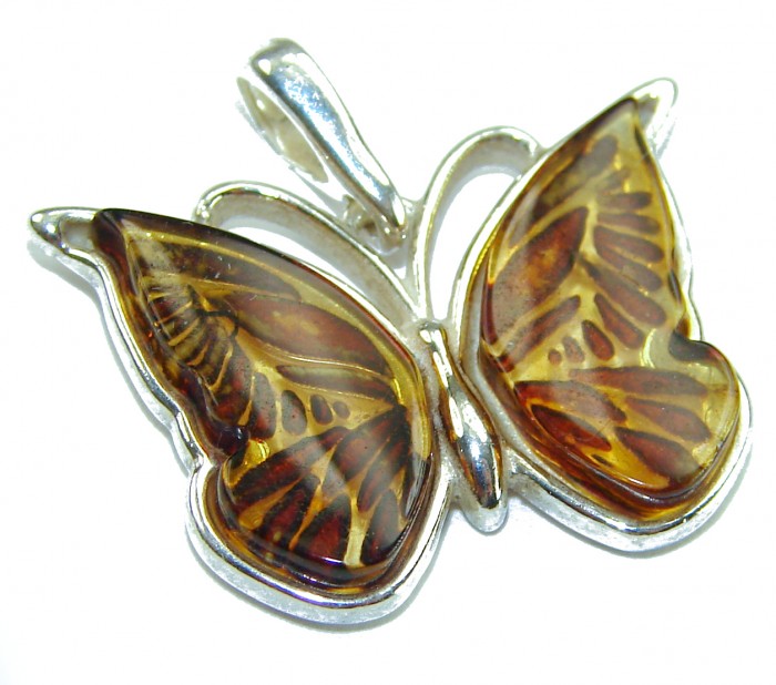 Cute Butterfly Authentic carved Baltic Amber .925 Sterling Silver handcrafted pendant