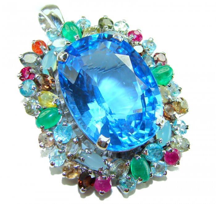 Oceania oval cut 32.8 carat Swiss Blue Topaz .925 Sterling Silver dipped in rhodium Handcrafted Pendant Brooch