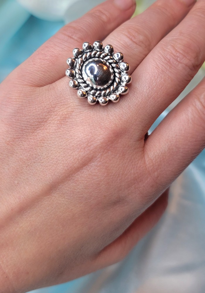Precious Flower Bali made .925 Sterling Silver handcrafted Ring s. 8 - Sterling silver ring worn on hand, detailed flower design, top view.