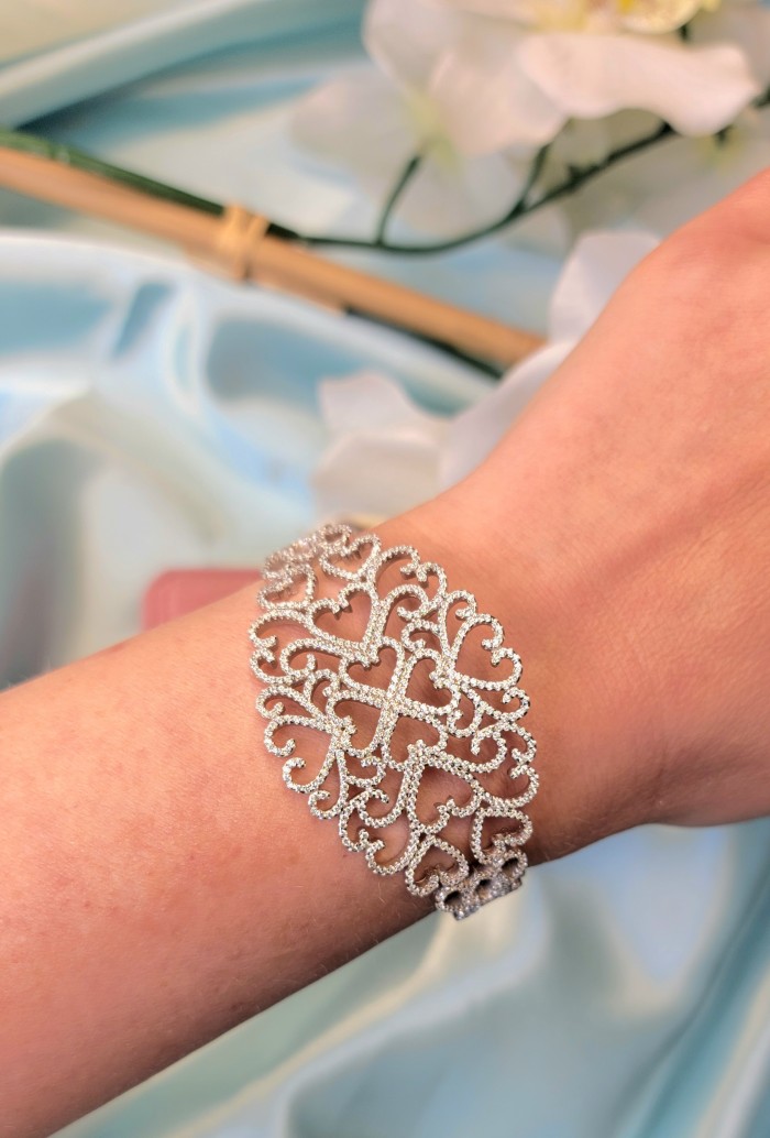 A Million Stars 28.8 carat White Sapphire .925 Sterling Silver Statement Bracelet / Cuff - Worn on wrist: ornate white sapphire bracelet in sterling silver.