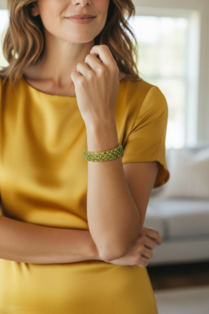 Great Masterpiece 61.2 carat genuine Peridot from Arizona 18k Gold over .925 Sterling Silver handmade Statement Bracelet - Worn on wrist: Great Masterpiece 61.2 carat Peridot bracelet.