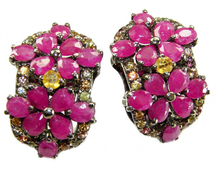 Bella Rosa Genuine 22.8 carat Ruby .925 Sterling Silver dipped in black rhodium Statement brilliantly handcrafted earrings - Close-up of Bella Rosa ruby earrings, floral design with sterling silver.