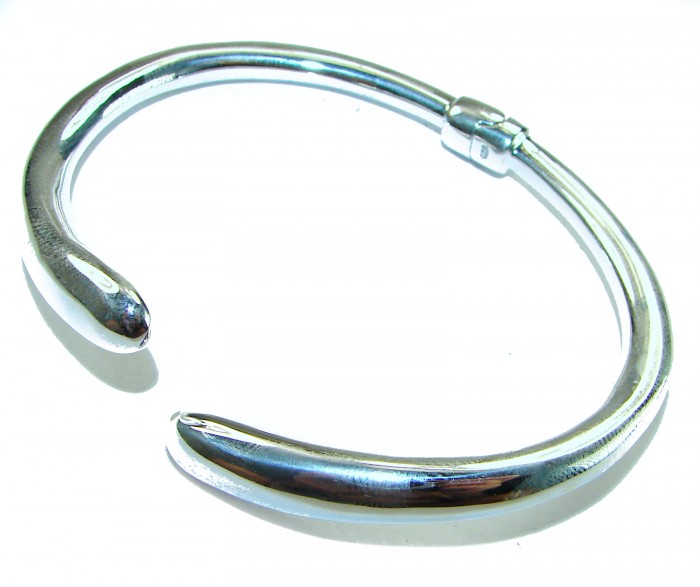 Fancy highly polished .925 Sterling Silver handcrafted Statement Italy made Bracelet - Highly polished .925 Sterling Silver handcrafted bracelet, angled view.