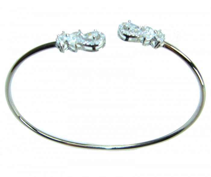Precious Light Natural 4.2 carat White Topaz .925 Sterling Silver bracelet - Open bangle with white topaz ends, top view.