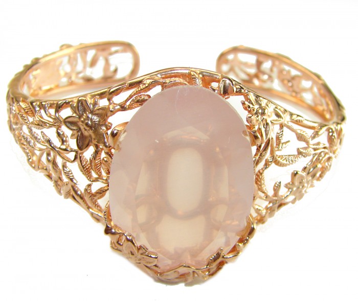 Incredible Genuine 52.2 carat Brazilian Rose Quartz Rose Quartz .925 Sterling Silver handcrafted Bracelet / Cuff - Rose quartz bracelet with floral filigree, front view.