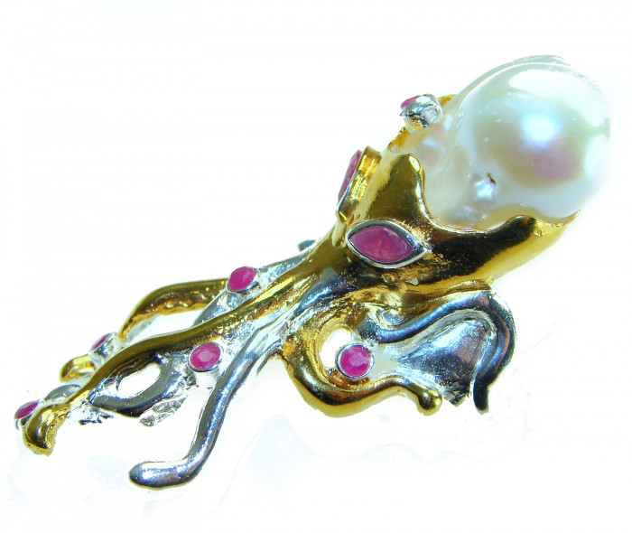 Massive Golden Mother of Pearl Octopus with Ruby eyes 18K Gold over .925 Sterling Silver handcrafted ring s. 8 1/4 - Side view of octopus-shaped gold jewelry with pearl and ruby stones.