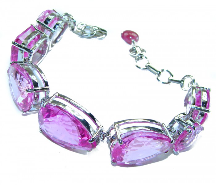 Tiffany - Magnificent Pink 125.5 carat Pink Sapphire .925 Sterling Silver handcrafted Heavy Bracelet - Pink sapphire bracelet, side view, silver setting, chain and clasp visible.