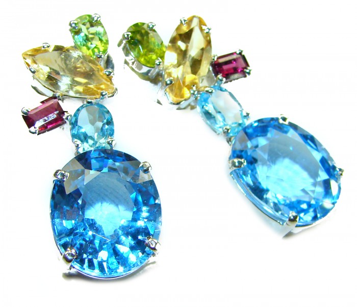 Atlantica 31.7 carat Swiss Blue Topaz .925 Sterling Silver Handcrafted Statement earrings - Close-up of multi-gemstone drop earrings with blue topaz centerpiece