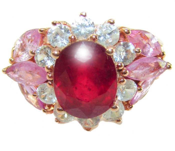 Bella Rosa Genuine 8.8 carat Kasmir Ruby .925 Sterling Silver dipped in 22K Rose Gold Statement Ring size 7 1/2 - Ruby and gemstone ring close-up against white background