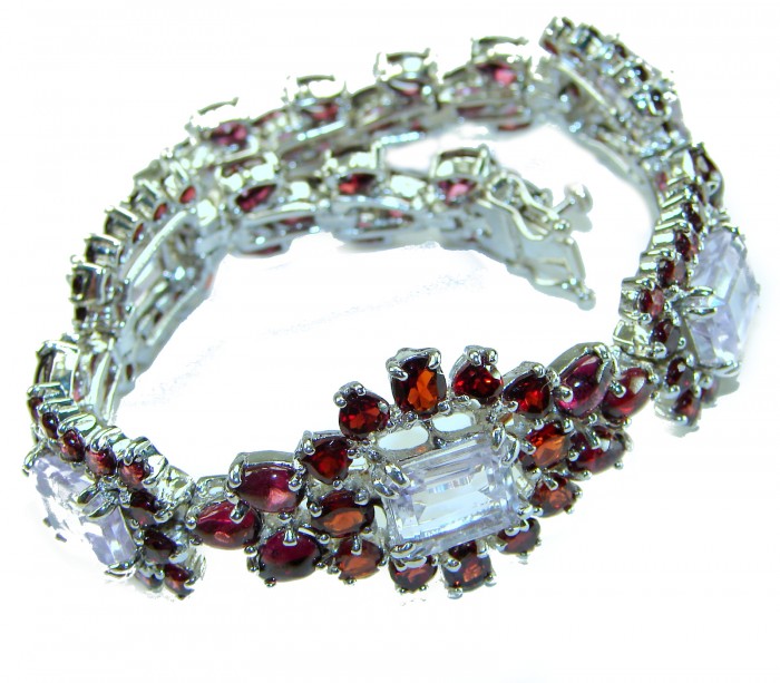 Tiffany - Magnificent 245.5 carat Pink Amethyst Garnet .925 Sterling Silver handcrafted Heavy Bracelet - Bracelet with pink amethyst and garnet stones in a looped side view