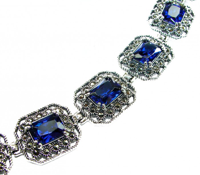 Real Gift of Nature 28.5 carat African Kyanite .928 Sterling Silver handcrafted Bracelet - Close-up of silver bracelet with blue kyanite gemstones in ornate settings.