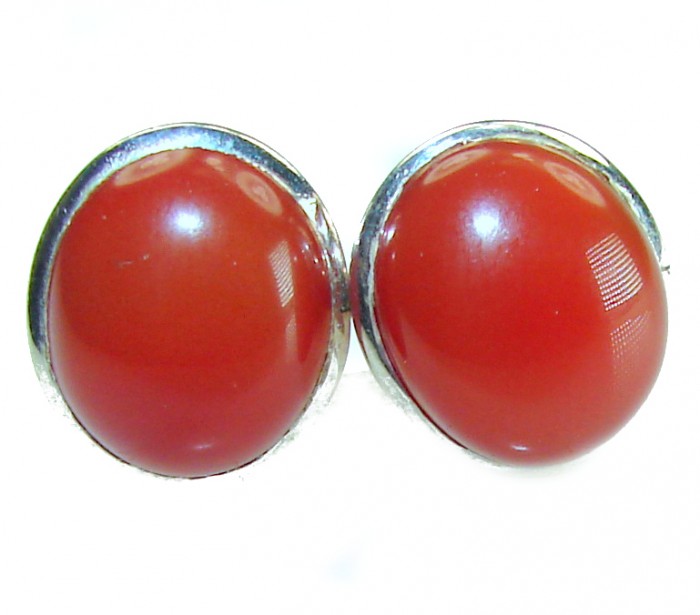 Sublime Orange Carnelian .925 Sterling Silver handmade earrings - Close-up of orange carnelian stones on sterling silver earrings.