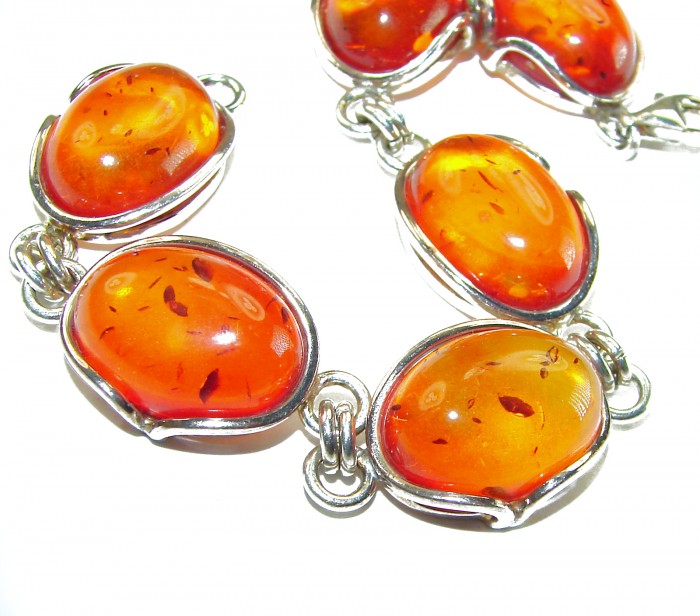 Excellent quality Baltic Amber .925 Sterling Silver entirely handcrafted Bracelet - Close-up of Baltic Amber stones in silver setting.