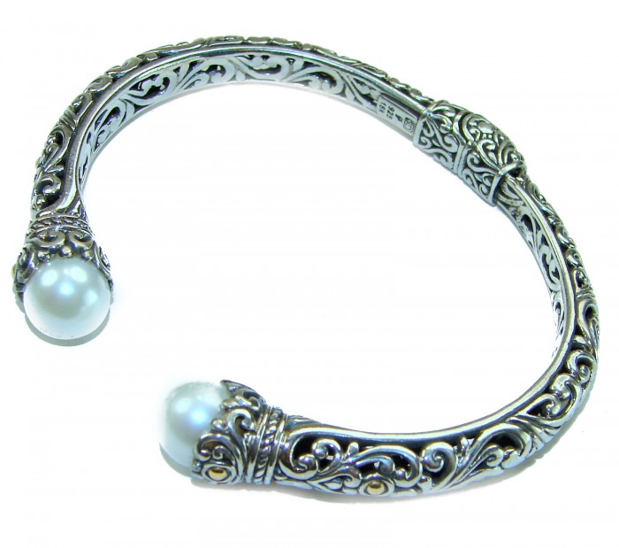 Bali Legacy authentic WHITE PEARL Floral Bracelet in .925 Sterling Silver - Intricate floral bracelet with pearls, side view of silver design.
