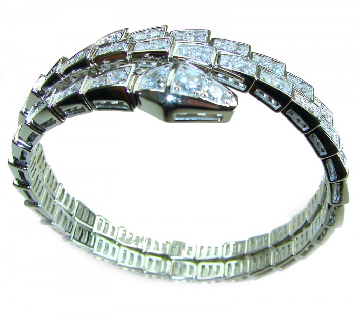 Precious Snake Genuine 55.5 carat White Topaz .925 Sterling Silver handcrafted spinal Bracelet - Side view of snake bracelet with white topaz stones in sterling silver.