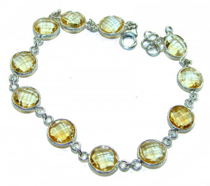 Victoria Authentic 27.2 carat Brazilian Citrine .925 Sterling Silver brilliantly dipped in real rhodium handcrafted Statement Bracelet - Citrine bracelet with sterling silver chain and clasp detail.