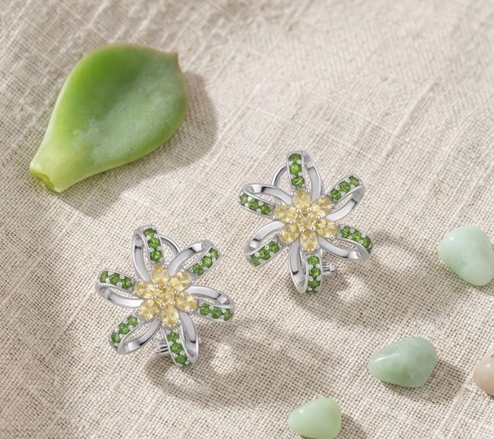 Wise Bliss Authentic 8.5 carat Chrome Diopside rhodium over .925 Sterling Silver handmade earrings - Floral earrings with green stones on textured fabric background.