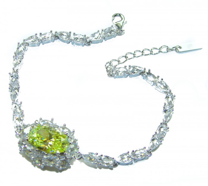Luxurious 22.5 carat oval cut Authentic Yellow Sapphire .925 Sterling Silver handcrafted Statement Bracelet - Bracelet with yellow sapphire, top view, showing clasp and extension chain.