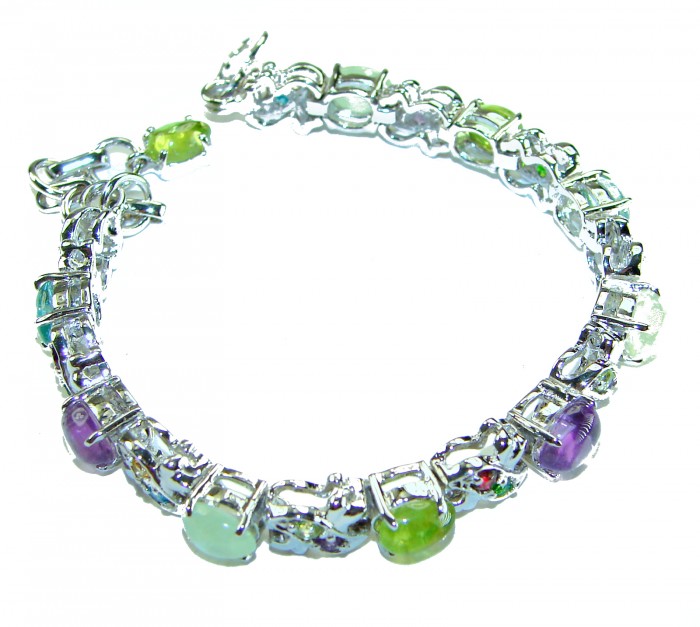 Perfect Fusion Natural Gemstones 39.5 carat Multigems .925 Sterling Silver handcrafted Statement Bracelet - Multigem bracelet side view, silver setting with colorful stones.