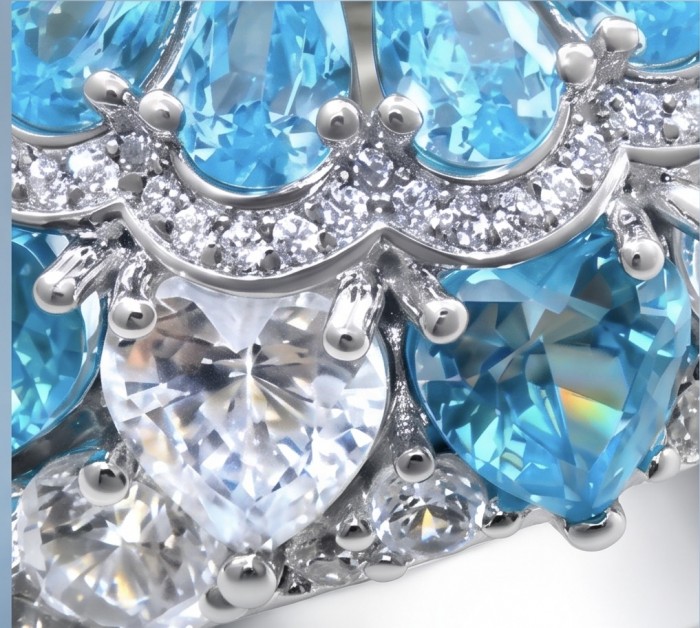 Blue Cascade Natural 14.8 carat Swiss Blue Topaz .925 Sterling Silver dipped in rhodium handmade Large Statement Ring size 6 - Close-up of Swiss Blue Topaz jewelry with heart-shaped gemstones.
