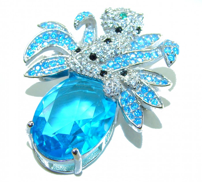 Blue Cheetah authentic 12.5 carat Swiss Blue Topaz .925 Sterling Silver Handcrafted pendant brooch - Blue cheetah brooch with Swiss blue topaz close-up.