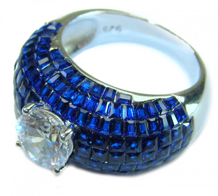 Precious Design oval cut 15.9 CARAT Sapphire White Topaz .925 Sterling Silver Statement Ring s. 8 1/4 - Side view of a sapphire and white topaz ring with intricate details