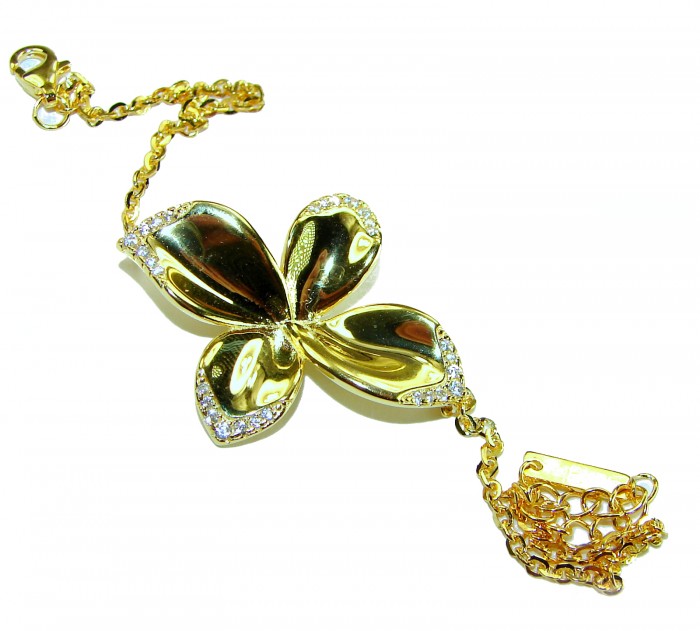 Lotus flower White Topaz highly polished 18K Gold over .925 Sterling Silver Italy made bracelet - Gold lotus pendant with white topaz, chain and clasp detail, top view.