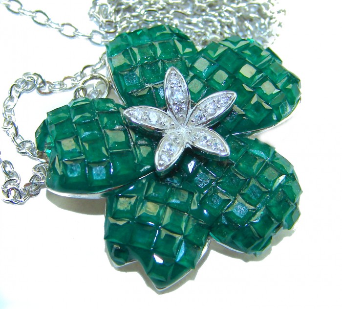 12.2 carat Graceful Authentic mystery setting Colombian Emerald .925 Sterling Silver handcrafted Statement necklace - Close-up of 12.2 carat Colombian emerald floral pendant necklace.