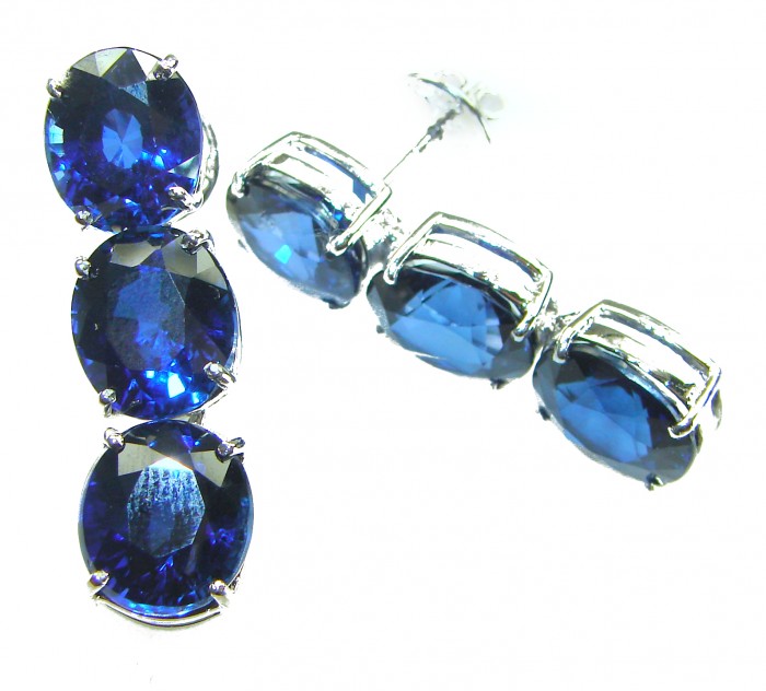 Deep Ocean 16.5 carat London Blue Topaz .925 Sterling Silver handmade Statement earrings - Side view of London Blue Topaz earrings with sterling silver setting.