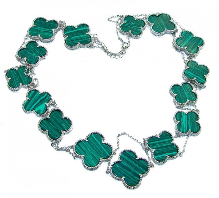 44 inches Outstanding authentic inlay Malachite Lucky Four Leaf Clover .925 Sterling Silver necklace - Necklace with green malachite clover shapes, overhead view.