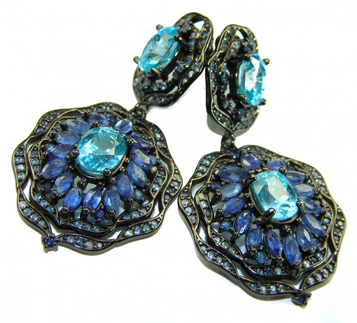 Atlantica 4.7 carat Swiss Blue Topaz .925 Sterling Silver dipped in black rhodium Handcrafted Statement earrings - Close-up of Atlantica earrings with Swiss Blue Topaz and blue stones.