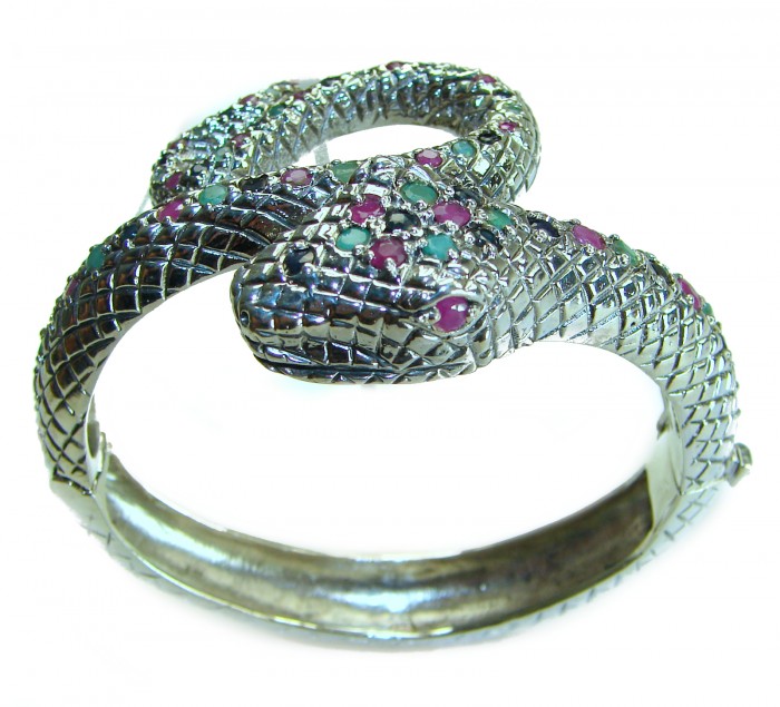 Huge 54.2 carat Precious Snake Genuine Ruby Emerald Sapphire .925 Sterling Silver handcrafted Bracelet - Snake bracelet with ruby, emerald, and sapphire stones, side view.