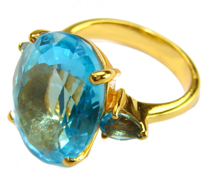 Pacifica - Authentic 17.8 carat Swiss Blue Topaz 22K Gold over .925 Sterling Silver handcrafted Large Statement ring size 8 1/4 - Blue topaz gold ring close-up with side view of stone and setting.