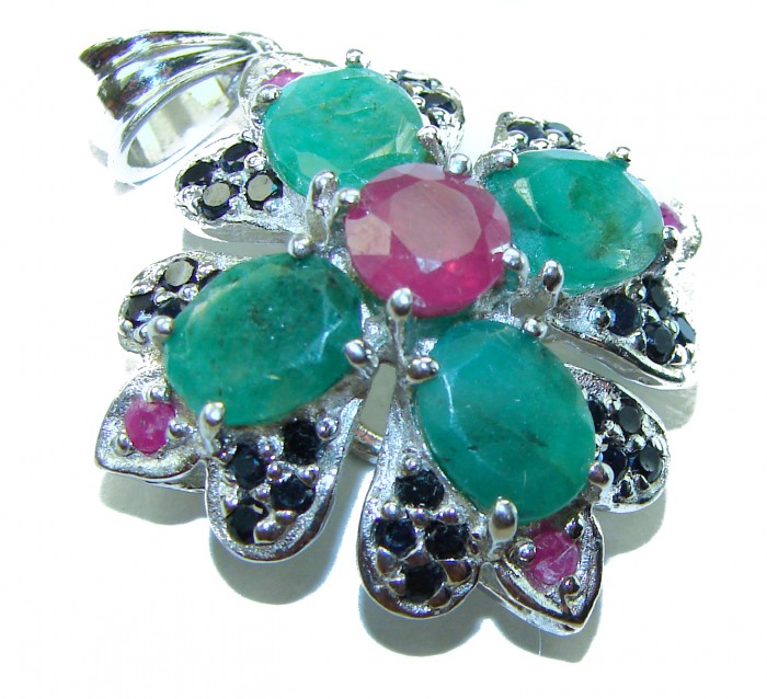 Spectacular 28.8 carat authentic Colombian Emerald .925 Sterling Silver handcrafted Pendant - Close-up of flower pendant with emerald and ruby stones.