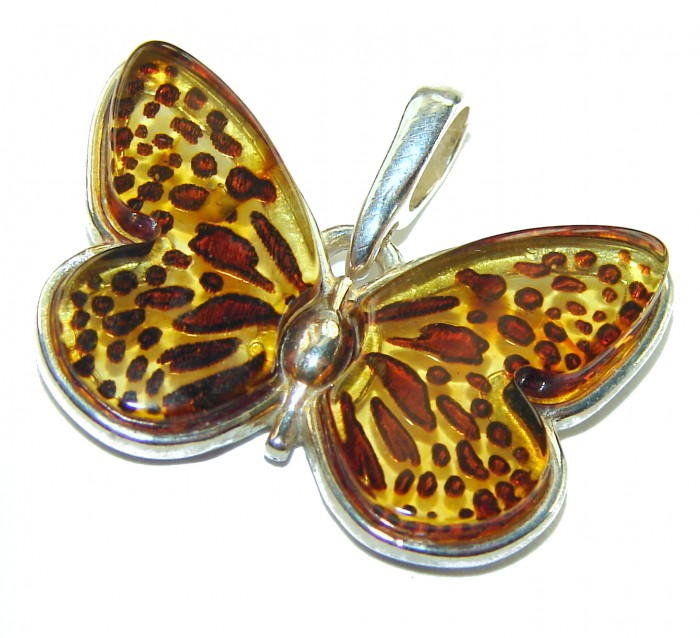 Prehistoric Authentic Butterscotch Baltic Amber .925 Sterling Silver beautifully handcrafted Pendant - Butterfly pendant in amber and sterling silver, top view