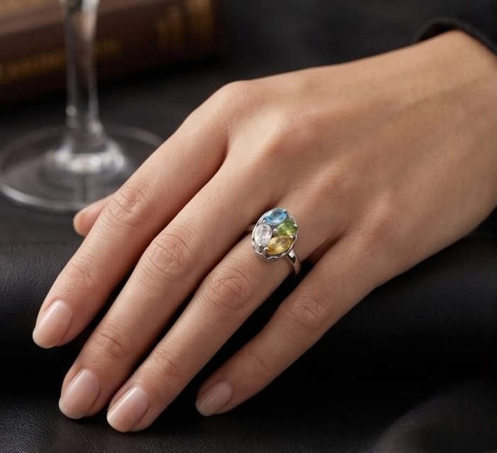 Precious Rainbow- authentic 7.2 carat multigem .925 Sterling Silver Eternity Ring size 8 - Multigem ring worn on hand, showcasing colorful stones and silver band.