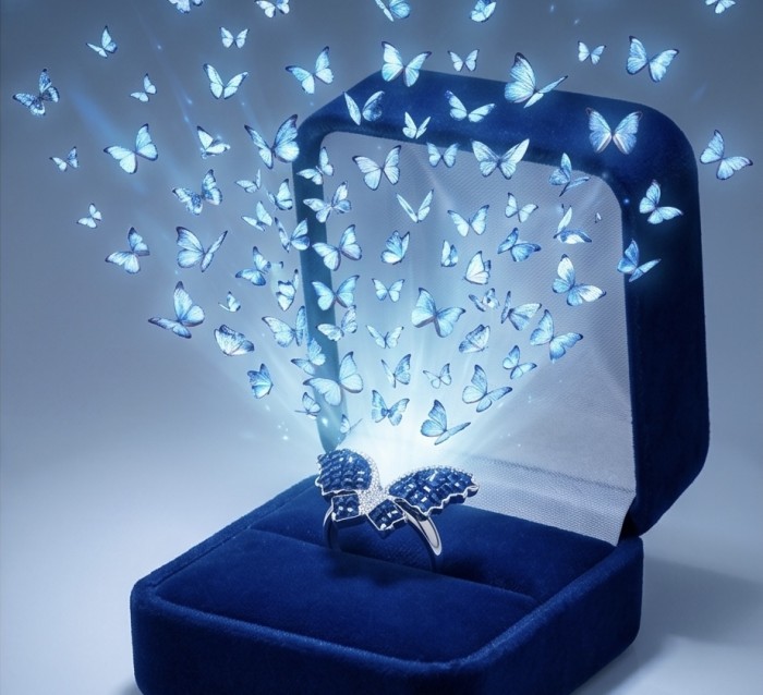 Blue Butterfly Authentic mystery setting 10.2 carat Sapphire .925 Sterling Silver handcrafted Ring size 7 - Butterfly ring with blue sapphires in open velvet box, top view.