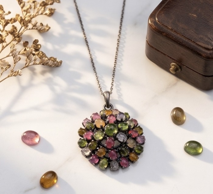 Rio de Janeiro 22.7 carat Brazilian Watermalon Tourmaline black rhodium over .925 Sterling Silver handmade Pendant - Colorful tourmaline pendant with a chain on a marble surface.