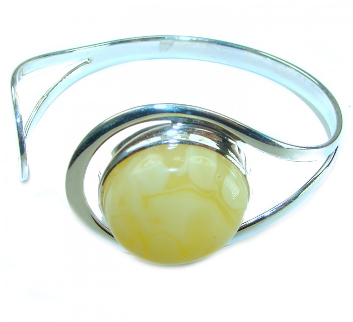 MODERN Design Genuine 15.5 carat Butterscotch Baltic Amber .925 Sterling Silver handmade Bracelet - Side view of silver bracelet with Butterscotch Baltic Amber stone.