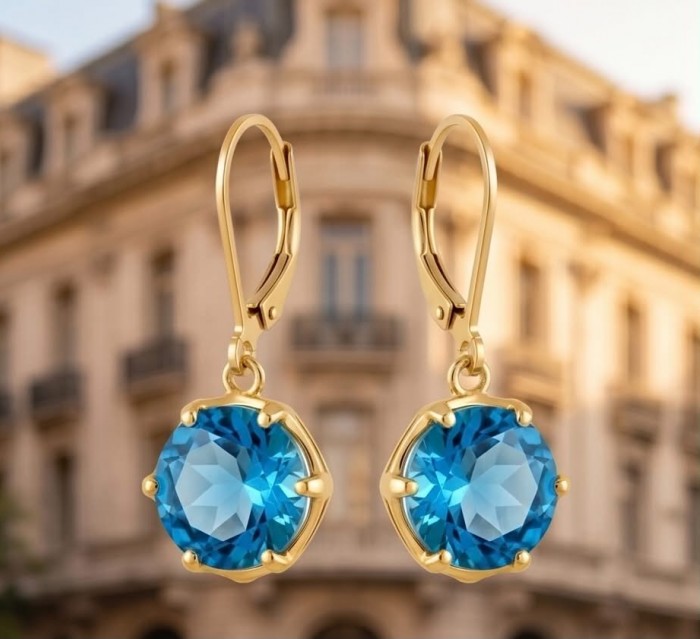 Atlantica 6.8 carat Swiss Blue Topaz 22K Gold over .925 Sterling Silver Handcrafted Statement earrings - Close-up of Atlantica Swiss Blue Topaz earrings with gold setting.