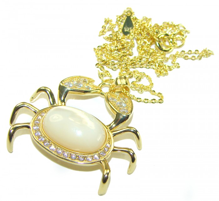 Precious Magic Crab 18K Gold over .925 Sterling Silver Necklace - Crab pendant necklace, gold with pearl, overhead view.
