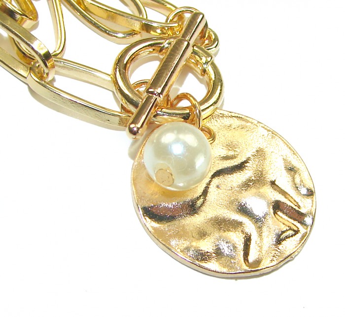 Giovanna - pearl 10K Gold over .925 Sterling Silver handcrafted necklace - Gold necklace with pearl and disc charm detail, close-up view.