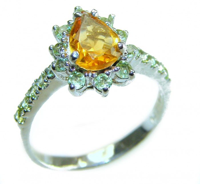 Golden Treasure 4.5 carat Citrine .925 Sterling Silver Handcrafted Ring size 7 1/4 - Citrine ring side view with silver band detail and accent stones.