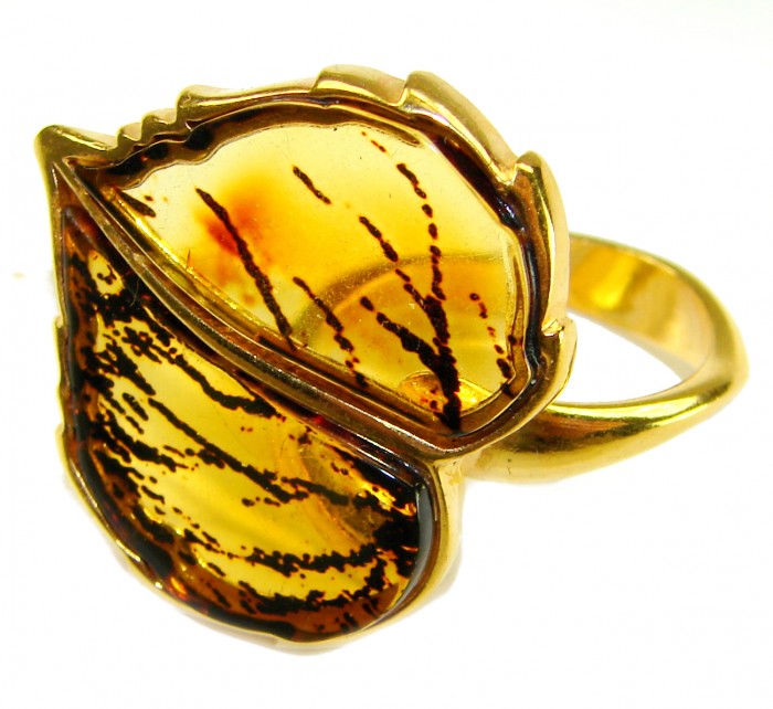 Authentic carved Baltic Amber .925 Sterling Silver dipped in 18K Gold handcrafted ring; s. 8 adjustable - Close-up of carved Baltic amber ring in silver with gold dip.
