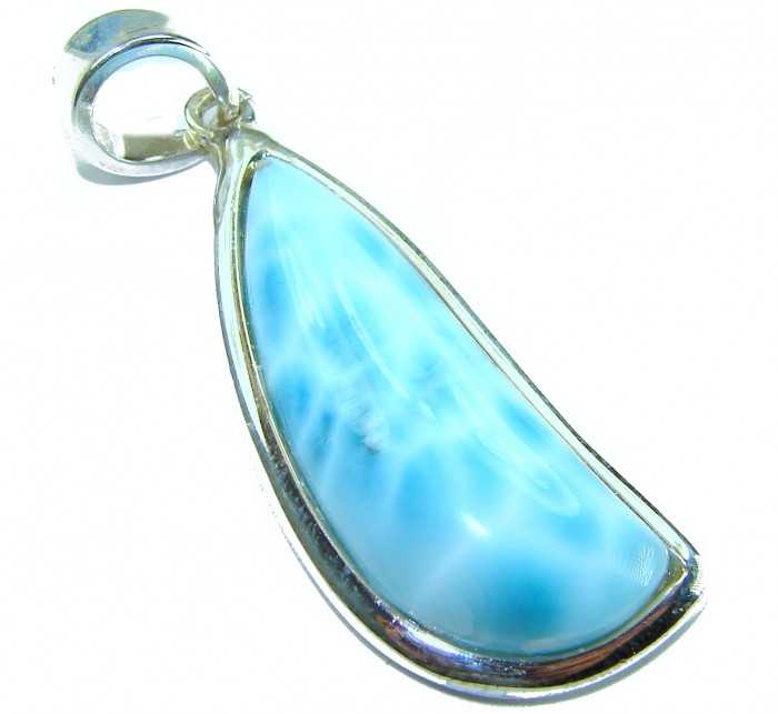 The best quality Natural Larimar from Dominican Republic .925 Sterling Silver handcrafted pendant - Close-up of natural larimar pendant from side angle.
