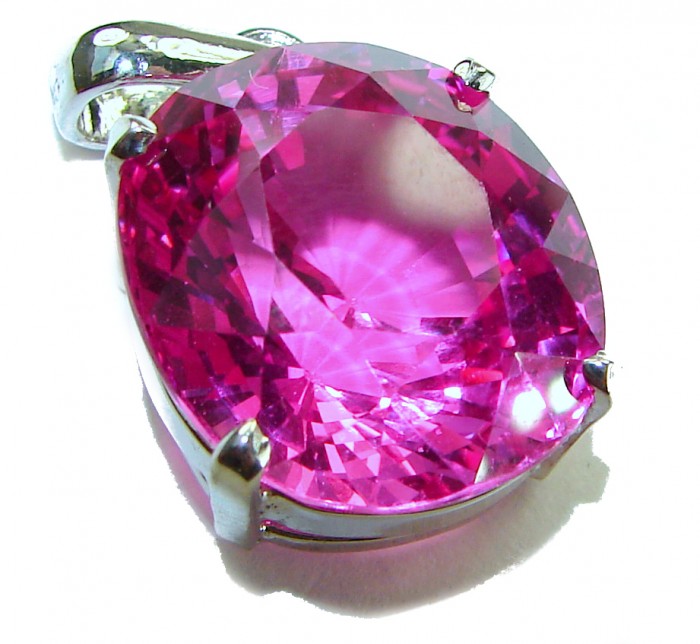Pink Beauty - Oval cut 14.4 carat Pink Sapphire .925 Sterling Silver handcrafted pendant - Close-up of 14.4 carat oval pink sapphire in sterling silver setting.