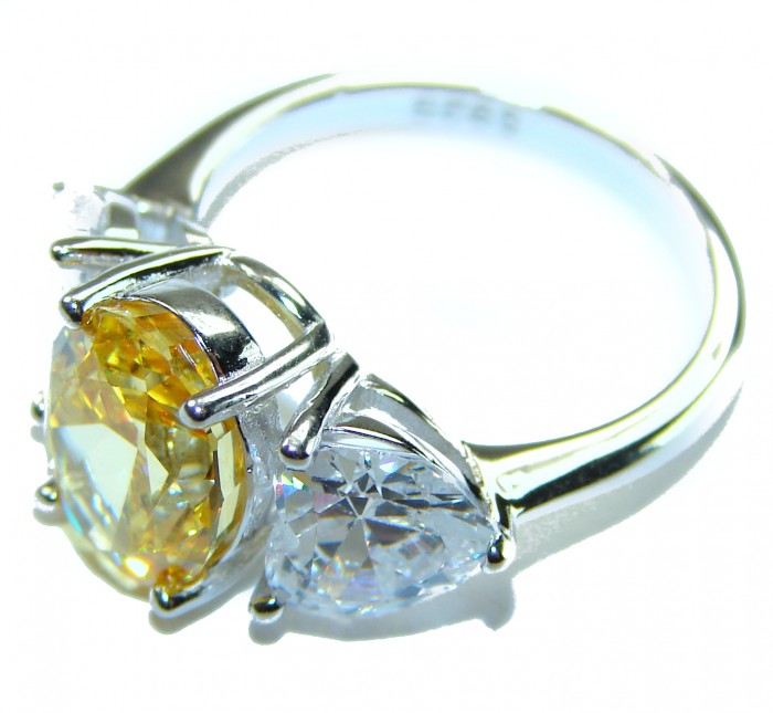 Oval cut 6.2 carat yellow Sapphire .925 Sterling Silver brilliantly handcrafted ring s. 6 - Oval cut yellow sapphire ring in side view with sterling silver band.