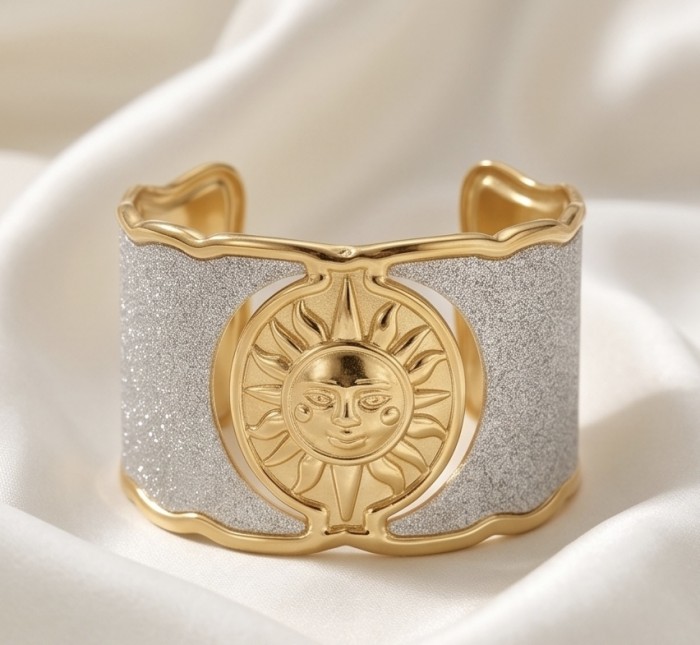 Renewal - Byzantine design Authentic Topaz 14K Gold over .925 Sterling Silver handcrafted Bracelet / Cuff - Gold and silver sun cuff bracelet, front view on white fabric.